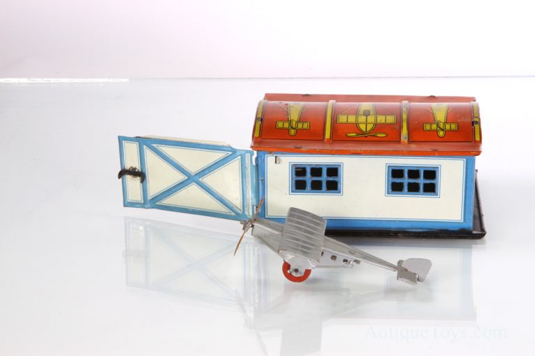 German Tin Lithographed Airplane Penny Toy with Hangar *SOLD ...