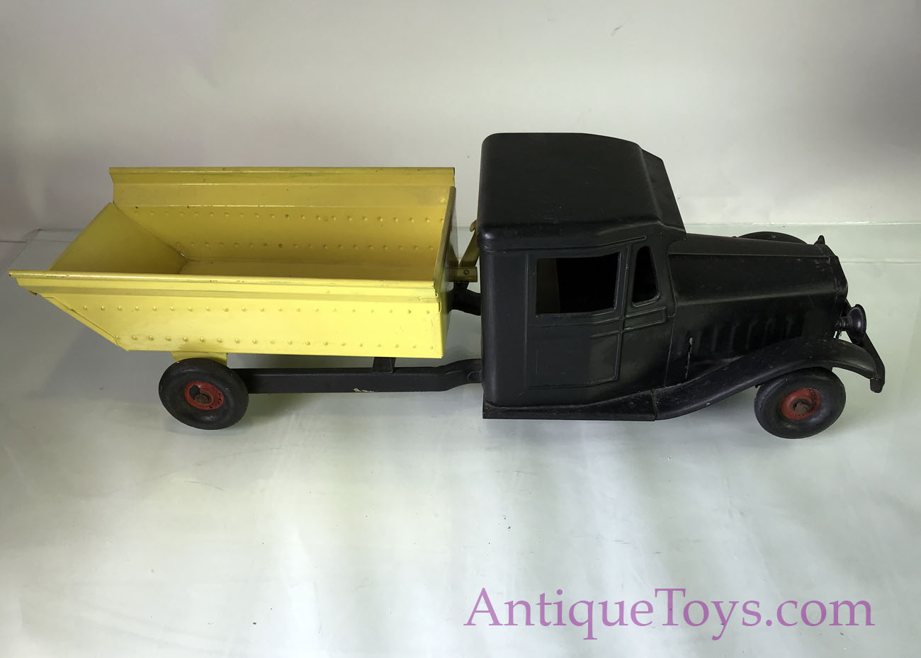 Cor-Cor Dump Truck in Black and Yellow *SOLD* – AntiqueToys.com ...