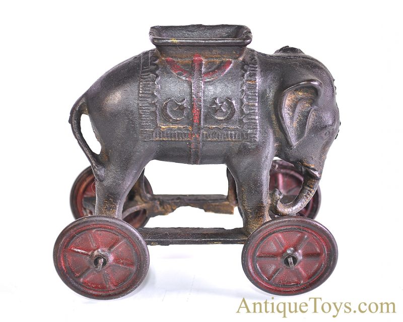 A.C. Williams ca. 1920's Cast Iron Elephant on Platform w/Wheels Still Penny Coin Bank <FONT COLOR="ff000 ">*SOLD*</font>