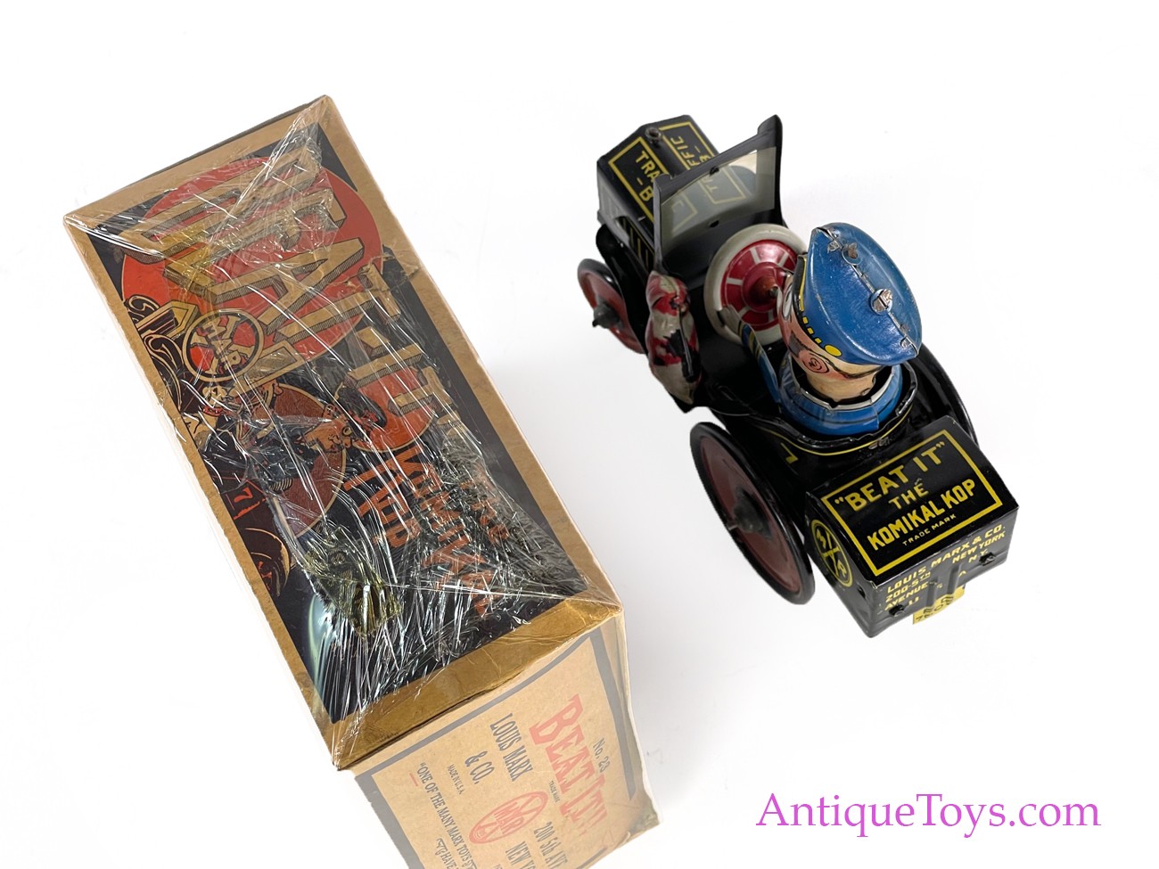 Komikal Kop Tin Wind-Up Toy by Louis Marx Co., circa 1930 For Sale at  1stDibs
