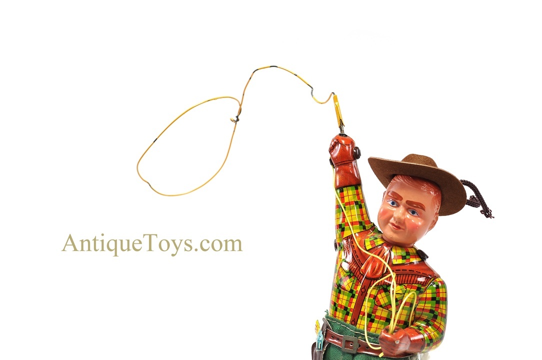 Wrangler Cowboy holding a online wire lasso Figurine - Vintage